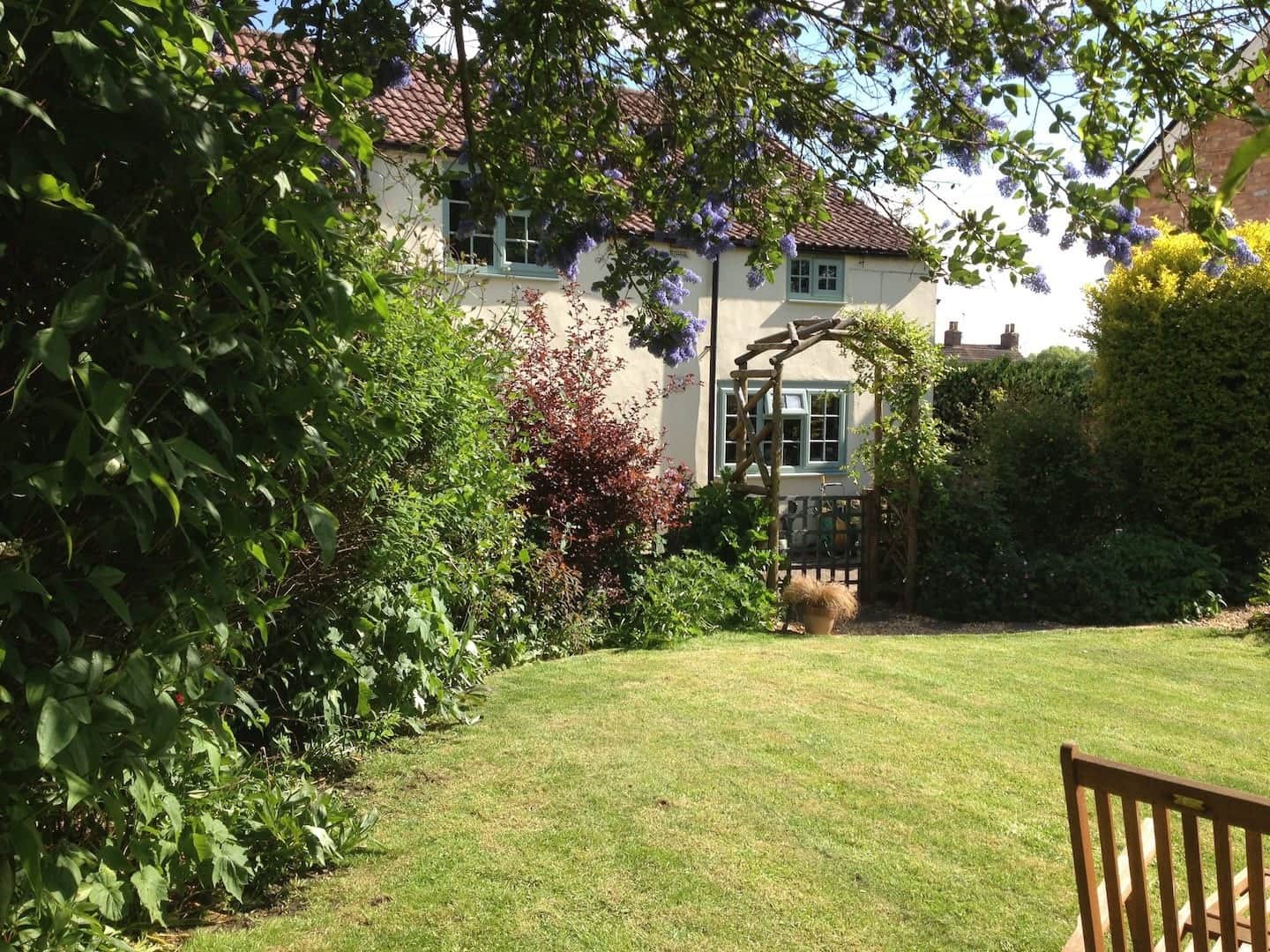 Rear of the cottage with a fully enclosed walled garden 